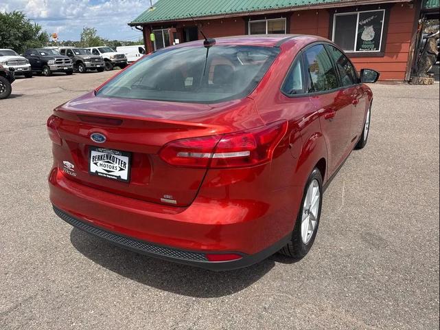 Photo of 2018 Hot Pepper Red Metallic Tinted Clearcoat Ford Focus