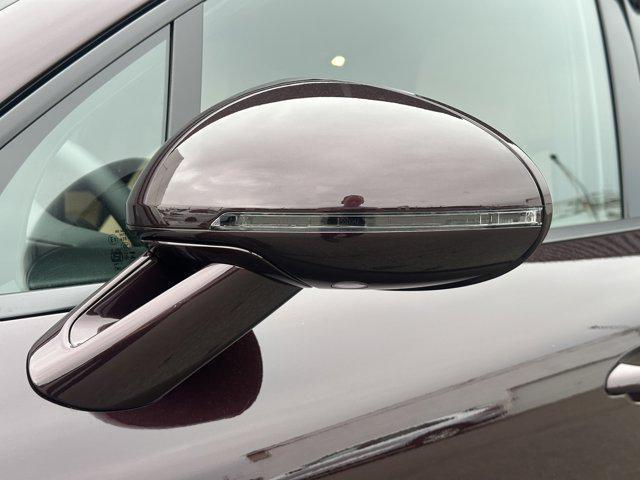 Photo of 2025 Copper Ruby Metallic Porsche Macan