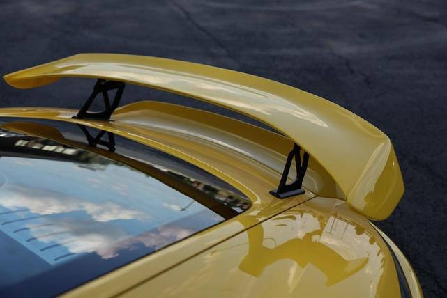 Photo of 2022 Racing Yellow Porsche 718 Cayman
