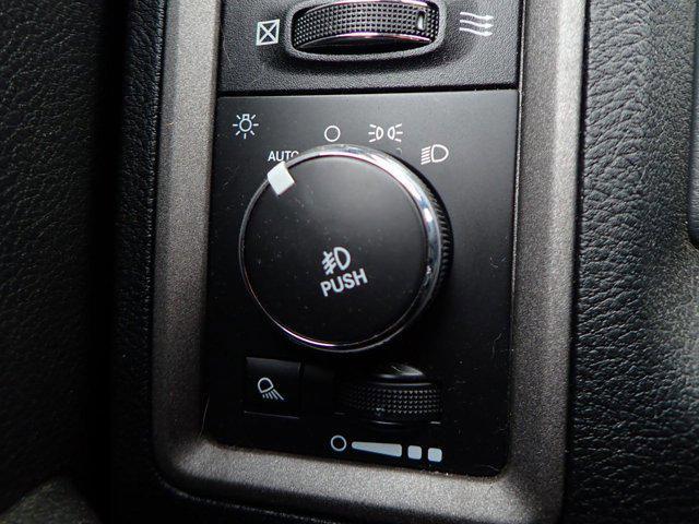 Photo of 2016 Flame Red Clearcoat RAM 1500