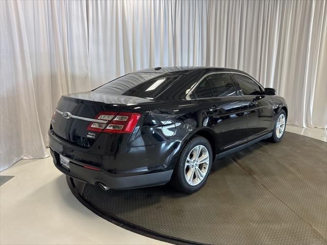 Photo of 2016 Shadow Black Ford Taurus