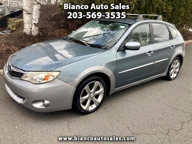 Photo of 2009 Newport Blue Pearl/Steel Silver Metallic Subaru Impreza