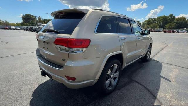 Photo of 2015 Tan Jeep Grand Cherokee