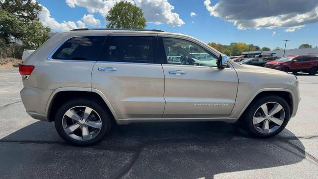 Photo of 2015 Tan Jeep Grand Cherokee