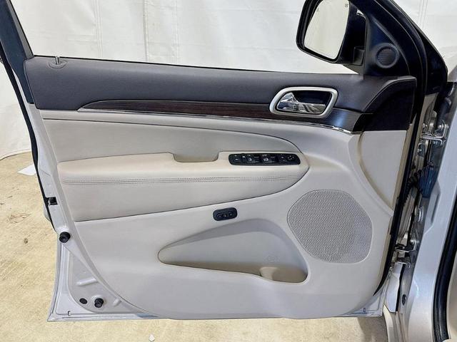 Photo of 2015 Tan Jeep Grand Cherokee
