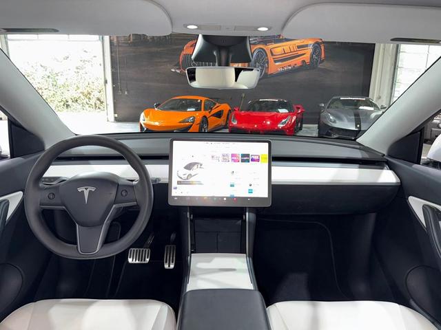 Photo of 2020 Pearl White Multi-Coat Tesla Model Y