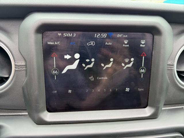 Photo of 2022 Black Clearcoat Jeep Wrangler Unlimited 4xe