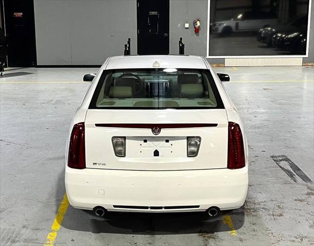 Photo of 2011 White Diamond Tricoat Cadillac STS