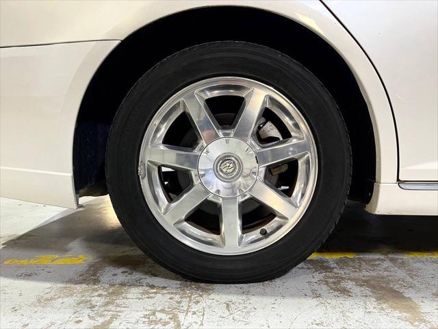 Photo of 2011 White Diamond Tricoat Cadillac STS