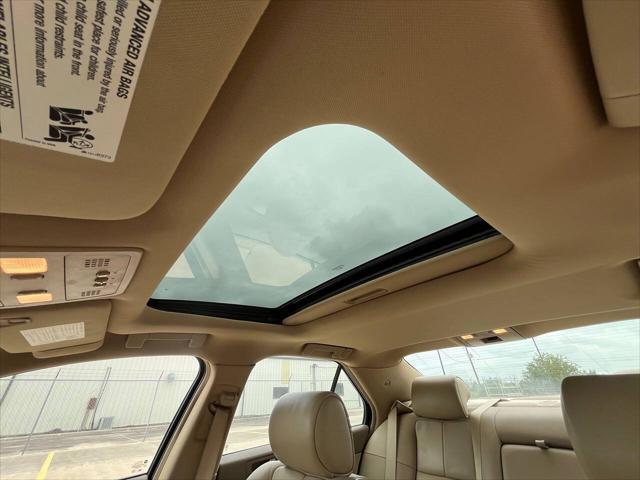 Photo of 2011 White Diamond Tricoat Cadillac STS