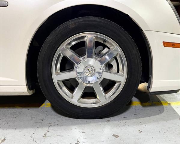Photo of 2011 White Diamond Tricoat Cadillac STS