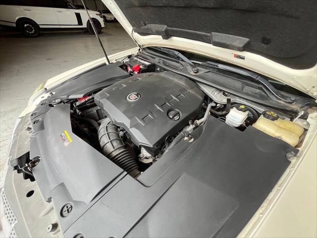 Photo of 2011 White Diamond Tricoat Cadillac STS