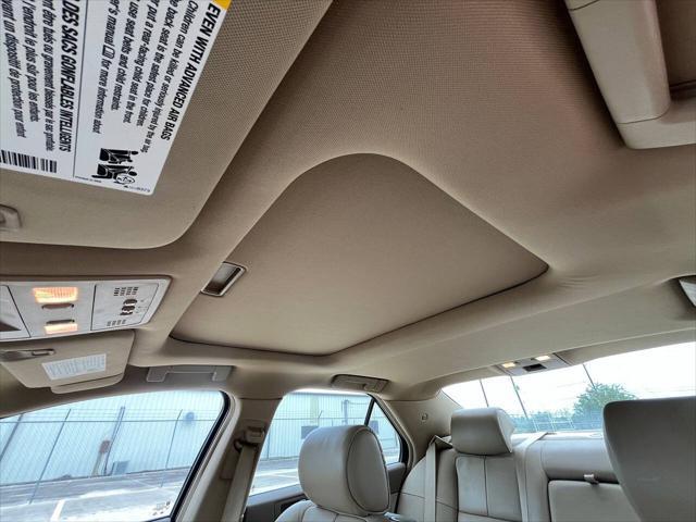 Photo of 2011 White Diamond Tricoat Cadillac STS