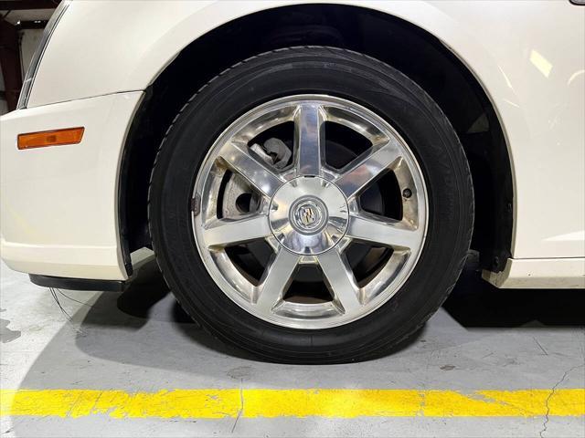 Photo of 2011 White Diamond Tricoat Cadillac STS