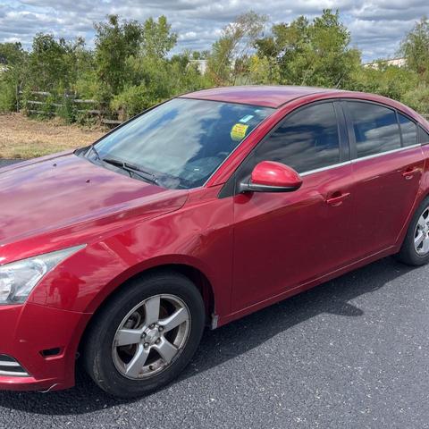 Photo of 2014 Crystal Red Tintcoat Chevrolet Cruze
