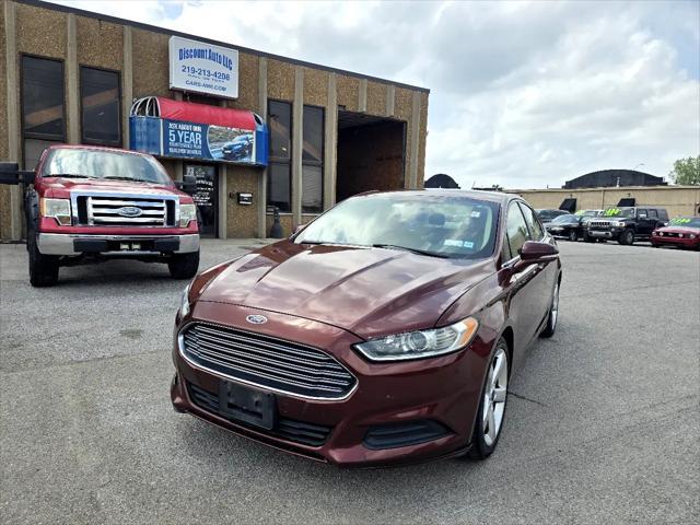 Photo of 2015 Ruby Red Tinted Clearcoat Ford Fusion
