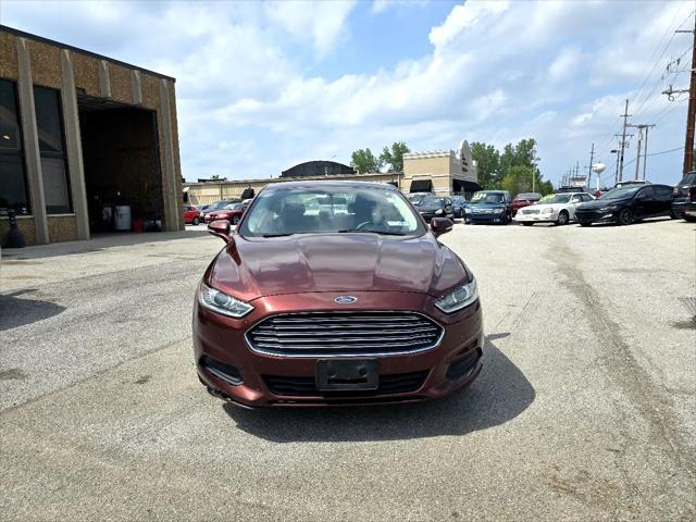 Photo of 2015 Ruby Red Tinted Clearcoat Ford Fusion