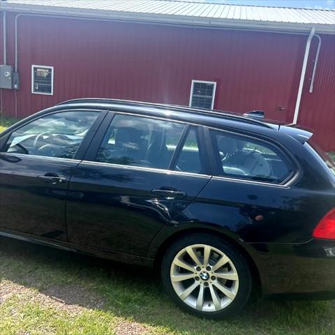 Photo of 2011 BLACK BMW 328