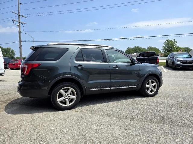 Photo of 2016 Dark Green Ford Explorer