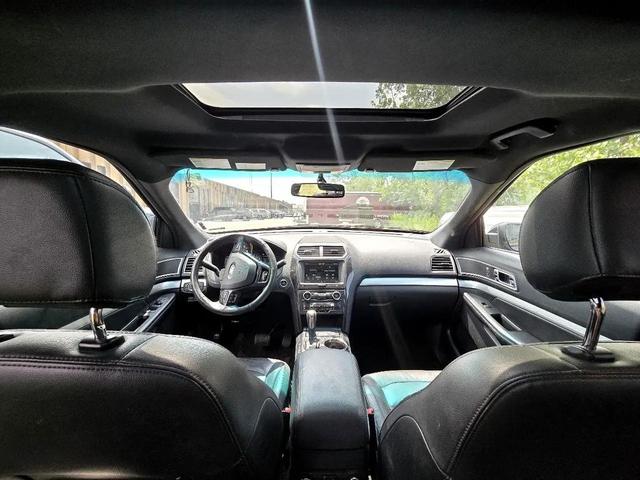Photo of 2016 Dark Green Ford Explorer