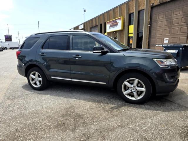 Photo of 2016 Dark Green Ford Explorer