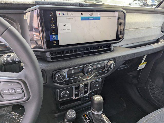 Photo of 2025 Granite Crystal Metallic Clearcoat Jeep Wrangler
