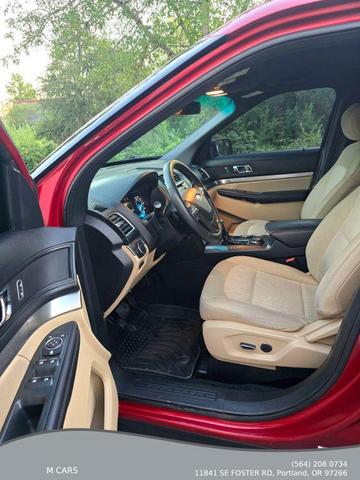 Photo of 2016 Ruby Red Metallic Tinted Clearcoat Ford Explorer
