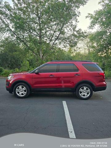 Photo of 2016 Ruby Red Metallic Tinted Clearcoat Ford Explorer
