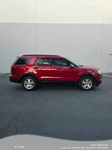 Photo of 2016 Ruby Red Metallic Tinted Clearcoat Ford Explorer