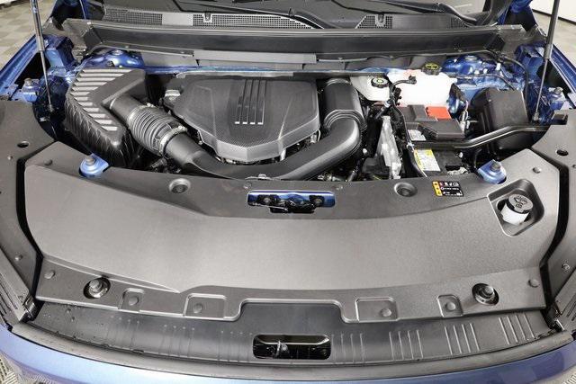 Photo of 2026 ocean blue metallic Buick Enclave
