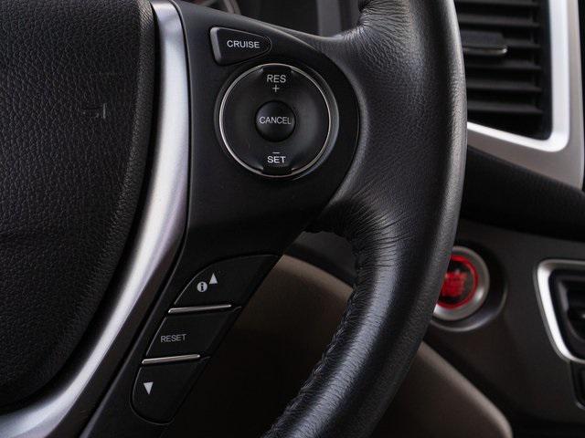 Photo of 2016 Black Forest Pearl Honda Pilot