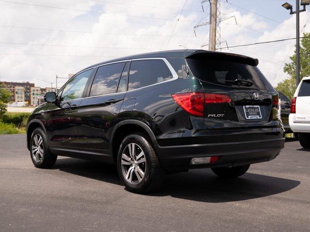 Photo of 2016 Black Forest Pearl Honda Pilot