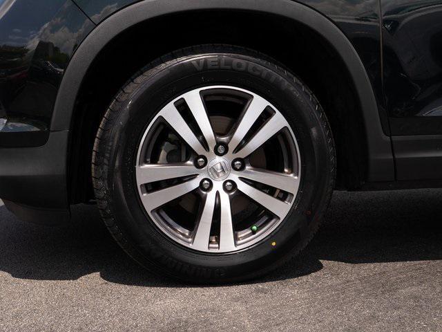 Photo of 2016 Black Forest Pearl Honda Pilot