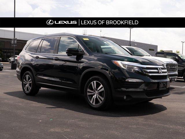 Photo of 2016 Black Forest Pearl Honda Pilot