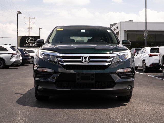 Photo of 2016 Black Forest Pearl Honda Pilot