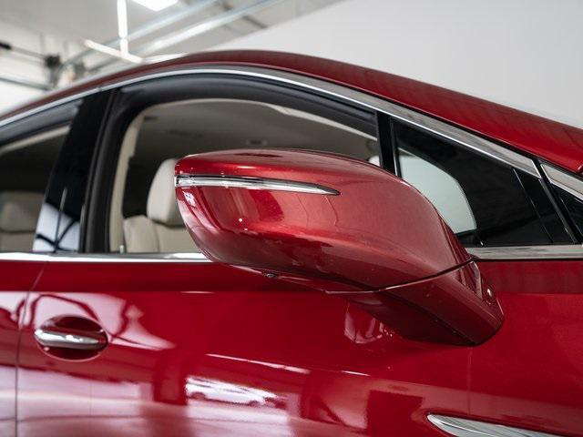 Photo of 2024 Cherry Red Tintcoat Buick Enclave