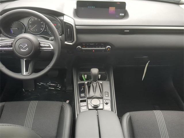 Photo of 2025 Wind Chill Pearl Mazda CX-50 Hybrid