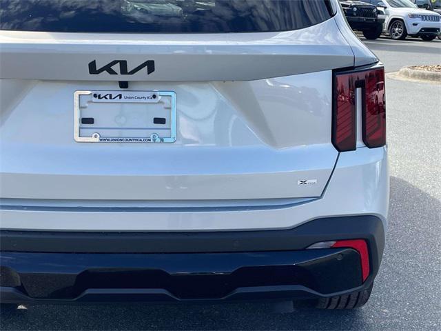 Photo of 2026 Ivory Silver Kia Sorento