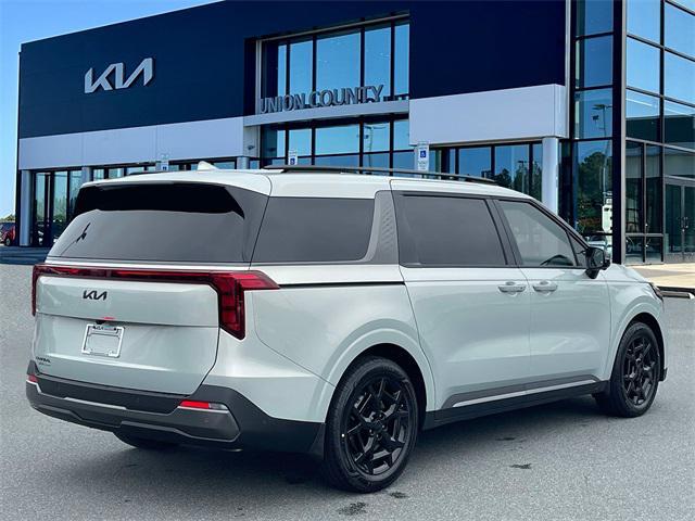 Photo of 2026 Ivory Silver Kia Carnival
