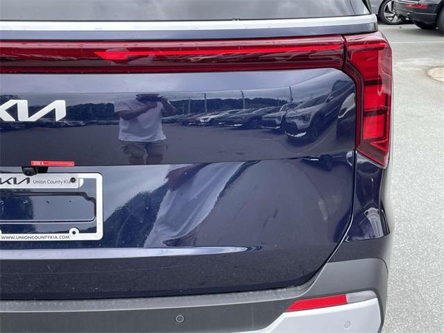 Photo of 2026 Deep Chroma Blue Kia Carnival