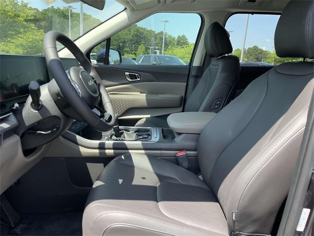 Photo of 2025 Deep Chroma Blue Kia Carnival