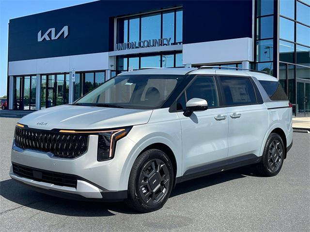 Photo of 2026 Ivory Silver Kia Carnival Hybrid