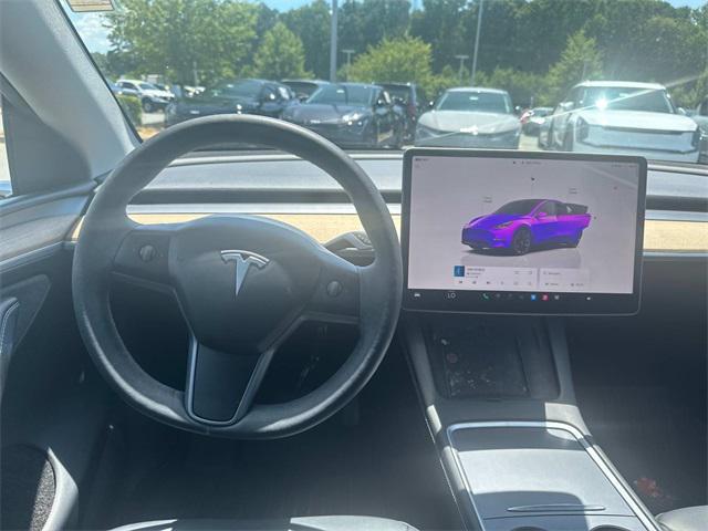 Photo of 2024 Pearl White Multi-Coat Tesla Model Y