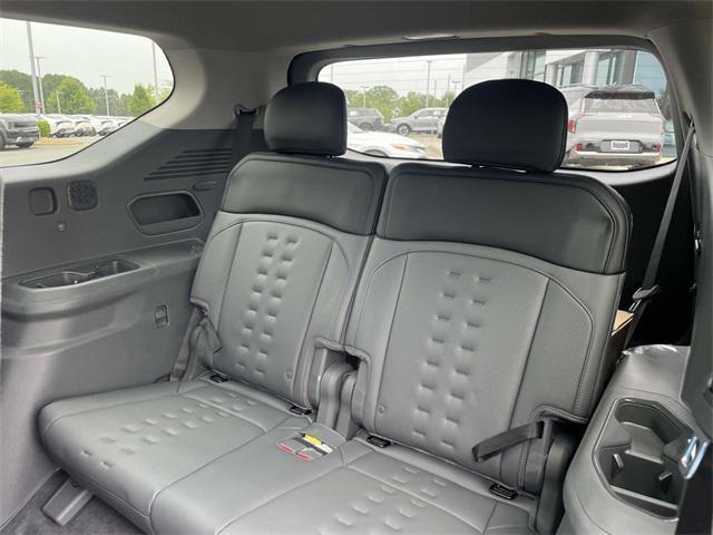 Photo of 2026 Ivory Silver Kia EV9