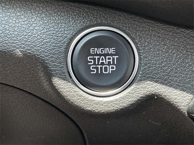 Photo of 2023 Fire Orange Kia Forte