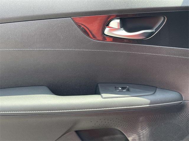 Photo of 2023 Fire Orange Kia Forte