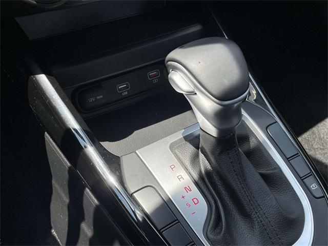 Photo of 2023 Fire Orange Kia Forte