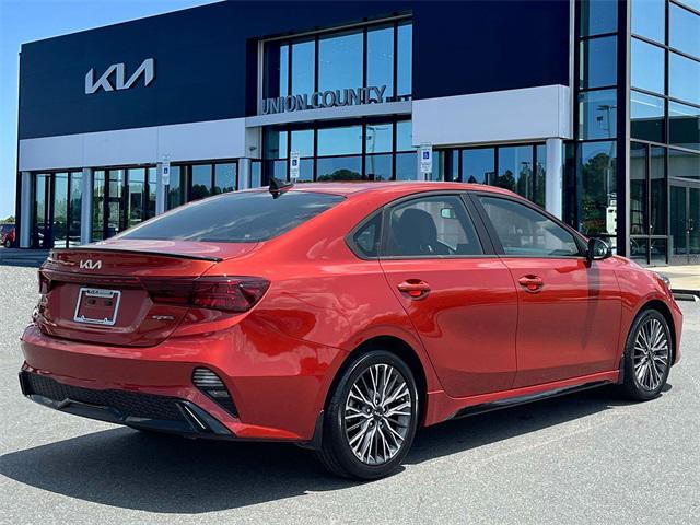 Photo of 2023 Fire Orange Kia Forte