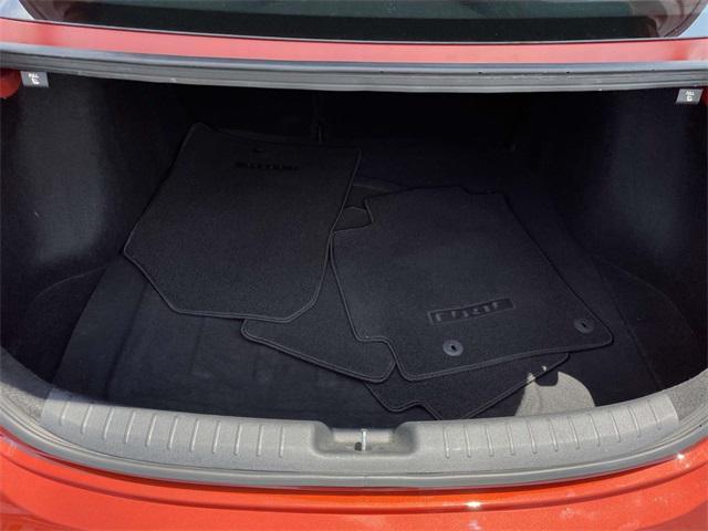 Photo of 2023 Fire Orange Kia Forte
