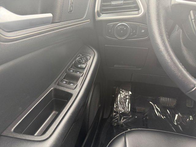 Photo of 2024 Agate Black Metallic Ford Edge